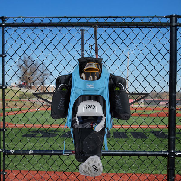 Rawlings Legion 2 Player's Backpack hanging on the dugout fence