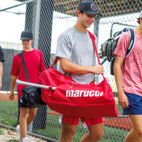 Player carrying the Marucci 2023 Team Utility Duffel Bag
