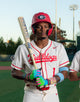 Player holding the 2026 Marucci RCKLESS Rewind Hybrid -3 BBCOR Baseball Bat - Cream