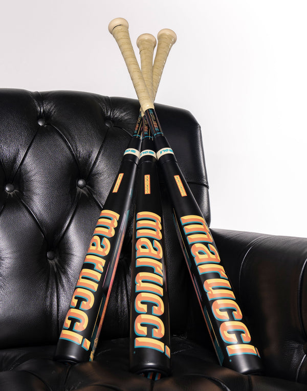 2027 Marucci CATX RCKLESS Hybrid -3 BBCOR Baseball Bats in a lounge chair