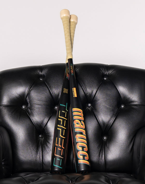 2027 Marucci CATX RCKLESS Torpedo Puck -3 BBCOR Baseball Bats sitting on a lounge chair