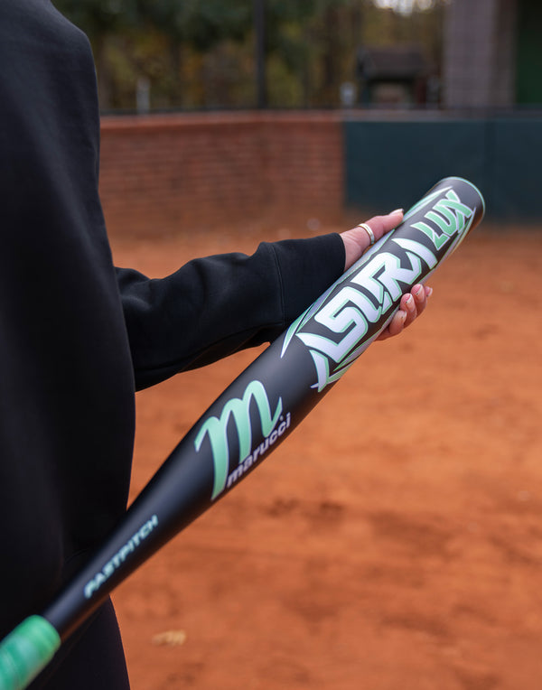 Player holding the Marucci Asura Lux Fastpitch Bat
