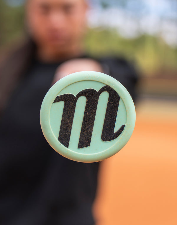 Close-up of the end cap of the Marucci Asura Lux Fastpitch Bat