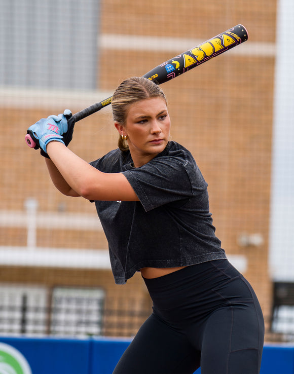 Player batting with the Marucci Asura Rise Pac-Man™ Fastpitch Bat