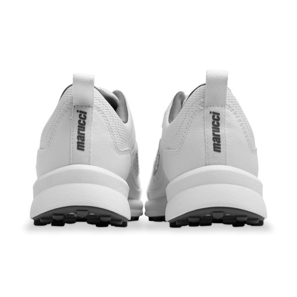 View of the heels of the Marucci CFT Youth Turf Shoe - White