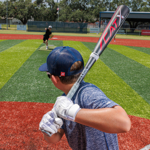 Young player batting with a Marucci Cat X Connect -11 USA Baseball Bat