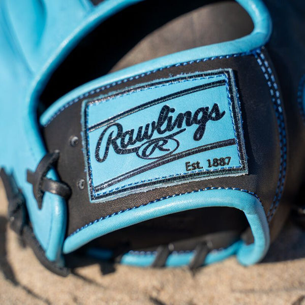 Close-up of the logo on the wrist of the Rawlings Heart of the Hide Spring Break 11.5" Baseball Glove