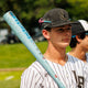 Player holding the 2025 Rawlings Clout AI™ -3 BBCOR Baseball Bat