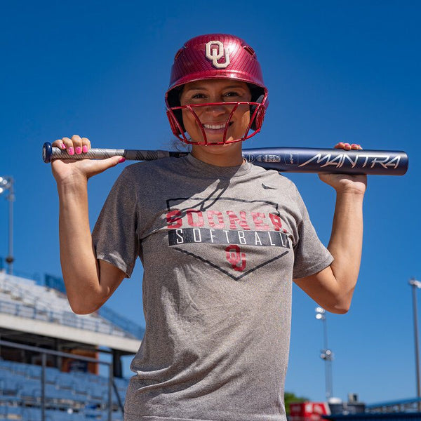 Elite player holding the 2025 Rawlings Mantra™ Fastpitch Bat