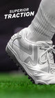 Close-up of the Ringor® Pro 2 Women's Fastpitch Turf Shoe - White worn by a player