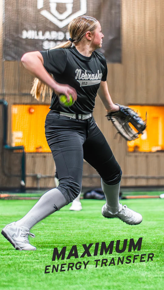 A player in the field wearing the Ringor® Pro 2 Women's Fastpitch Turf Shoe - White