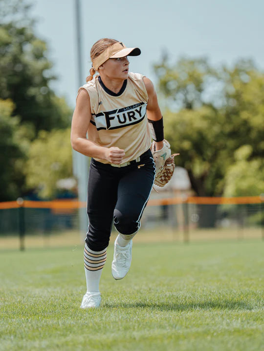 Player wearing the Ringor® Pro 2 Women's Molded Fastpitch Cleat - White in a game