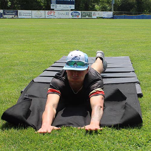 Player practicing with the Safe Slide Baseball/Softball Sliding Mat