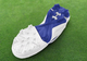 View of the sole of the Under Armour Leadoff Low RM Jr. 3.0 Youth Molded Cleat - Royal/White