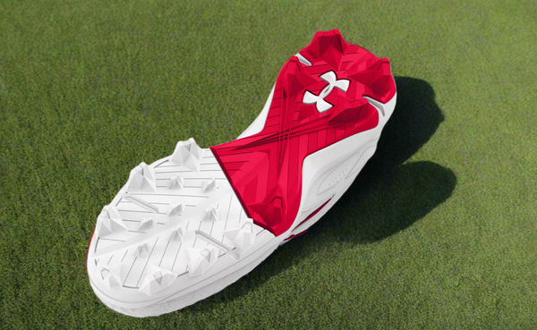 View of the sole of the Under Armour Leadoff Low RM Jr. 3.0 Youth Molded Cleat - Red/White