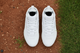 Top view of the Under Armour Youth Harper 10 RM Jr. Baseball Cleats - White/Stone