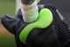 Batter wearing the ThumbPro Batter's Thumb Guard