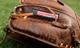 Close-up of the custom stamping along the fingers of the Nokona Walnut Edge™ Precision 11.5" I-Web Baseball Glove
