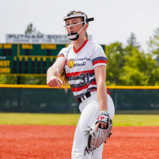 Player wearing a fielder's mask with the Rip-It Pony Tail Strap