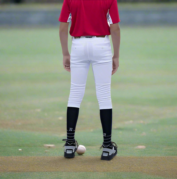 Player modeling the youth Marucci EXCEL "Tweener" Baseball Pant - 