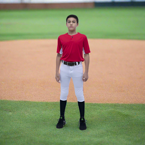 Player modeling the youth Marucci EXCEL "Tweener" Baseball Pant - White