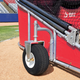 Close-up view of the tires on the Bomber Elite Rolling Batting Cage