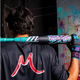 Player holding the 2026 Marucci CATX RCKLESS Composite -10 USSSA Junior Big Barrel Baseball Bat