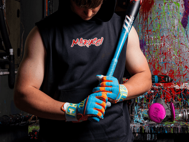Player posing with the 2026 Marucci CATX RCKLESS -10 Senior League USSSA Big Barrel Baseball Bat