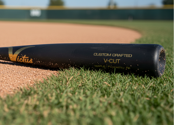 Close-up of the barrel on the Victus Pro V Cut Flat Maple Wood Baseball Bat - Charcoal