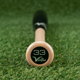 Close-up of the knob on the Victus Pro V Cut Gloss Maple Wood Baseball Bat - Natural/Gloss Black