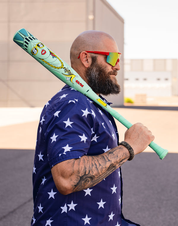 Man carrying the Victus Nova Lit Beacon USSSA Baseball Bat