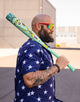 Man carrying the Victus Nova Lit Beacon USSSA Baseball Bat