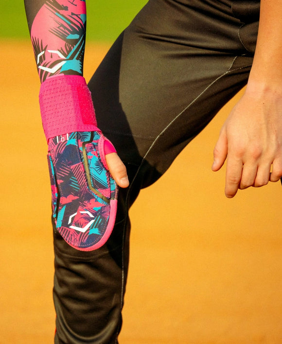 Player wearing the Evoshield X-SRZ™ Miami Vice Sliding Mitt 2.0