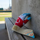 View of the Evoshield Youth X-SRZ™ Carbyne Batting Glove with Strap - Red/White/Ice with the strap extended