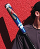 Player holding the 2025 DeMarini Zen™ -3 BBCOR Baseball Bat