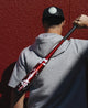 Player holding a 2025 Demarini Voodoo® One -3 BBCOR Baseball Bat