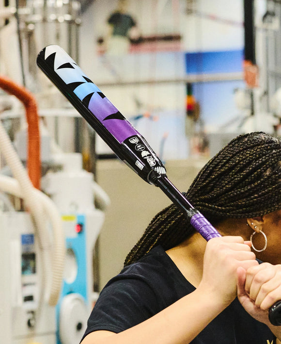 Player testing the swing of the 2026 DeMarini Prism+™ FE -11 Fastpitch Bat