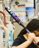 Player testing the swing of the 2026 DeMarini Prism+™ FE -11 Fastpitch Bat