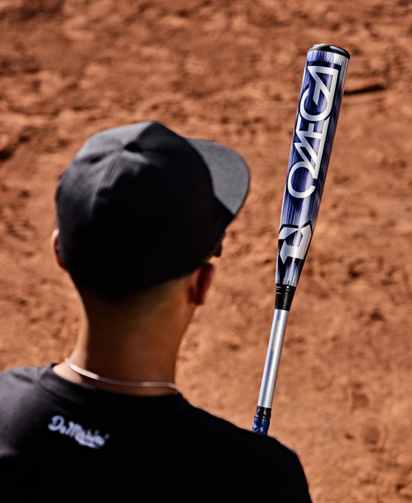 Player getting ready to bat with the 2027 DeMarini Omega -3 BBCOR Baseball Bat
