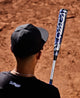 Player getting ready to bat with the 2027 DeMarini Omega -3 BBCOR Baseball Bat