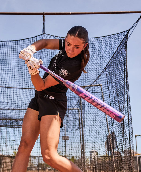 Player swinging the 2027 DeMarini Future™ Fastpitch Bat