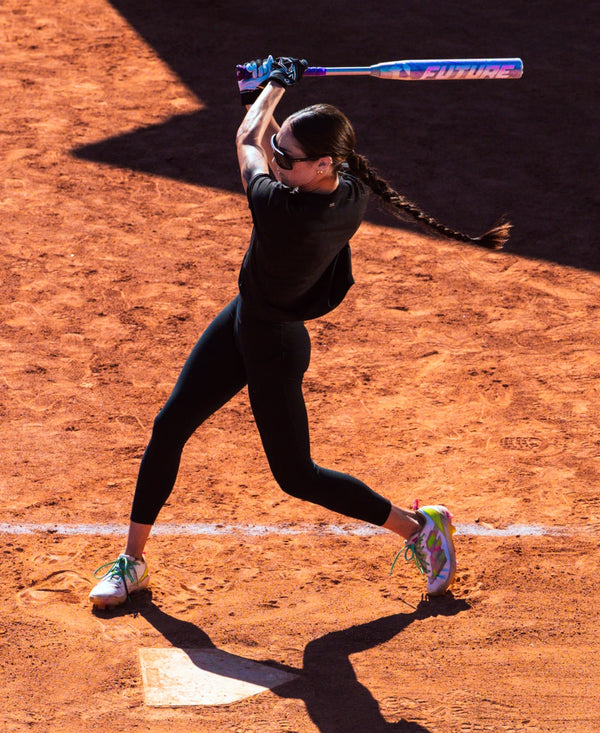 Player swinging the 2027 DeMarini Future™ Fastpitch Bat