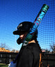 Player shouldering the 2027 DeMarini Vizion Fastpitch Bat before batting
