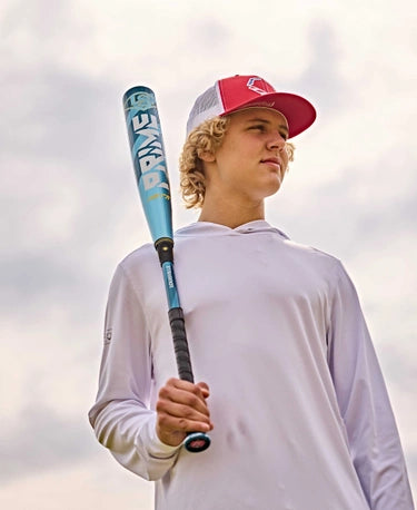 Player holding a 2025 Louisville Slugger META® Prime -8 USSSA Baseball Bat