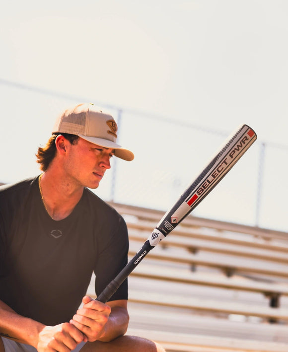 Player sitting in the stands with the  2026 Louisville Slugger Select PWR™ -3 BBCOR Baseball Bat