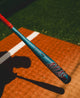 Player in the shadows preparing to hit with the 2026 Louisville Slugger Atlas™ -3 BBCOR Baseball Bat, shown in the light