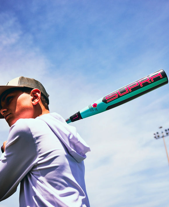 Player posing with the 2026 Louisville Slugger Supra™ USSSA Baseball Bat