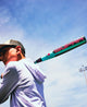 Player posing with the 2026 Louisville Slugger Supra™ USSSA Baseball Bat