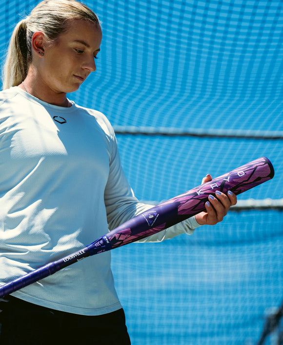Player holding the 2026 Louisville Slugger KRYO Thundernight Fastpitch Bat