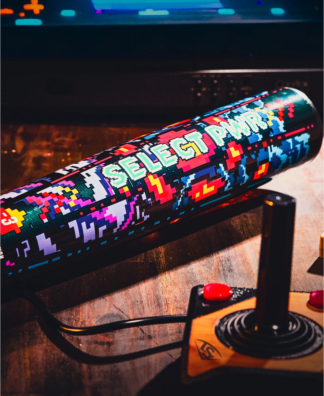 2026 Louisville Slugger Select PWR™ Player 1 -3 BBCOR Baseball Bat on a gaming table